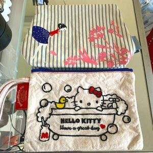 Makeup cosmetic bags Hello Kitty and L’occitane never used  Set of 2